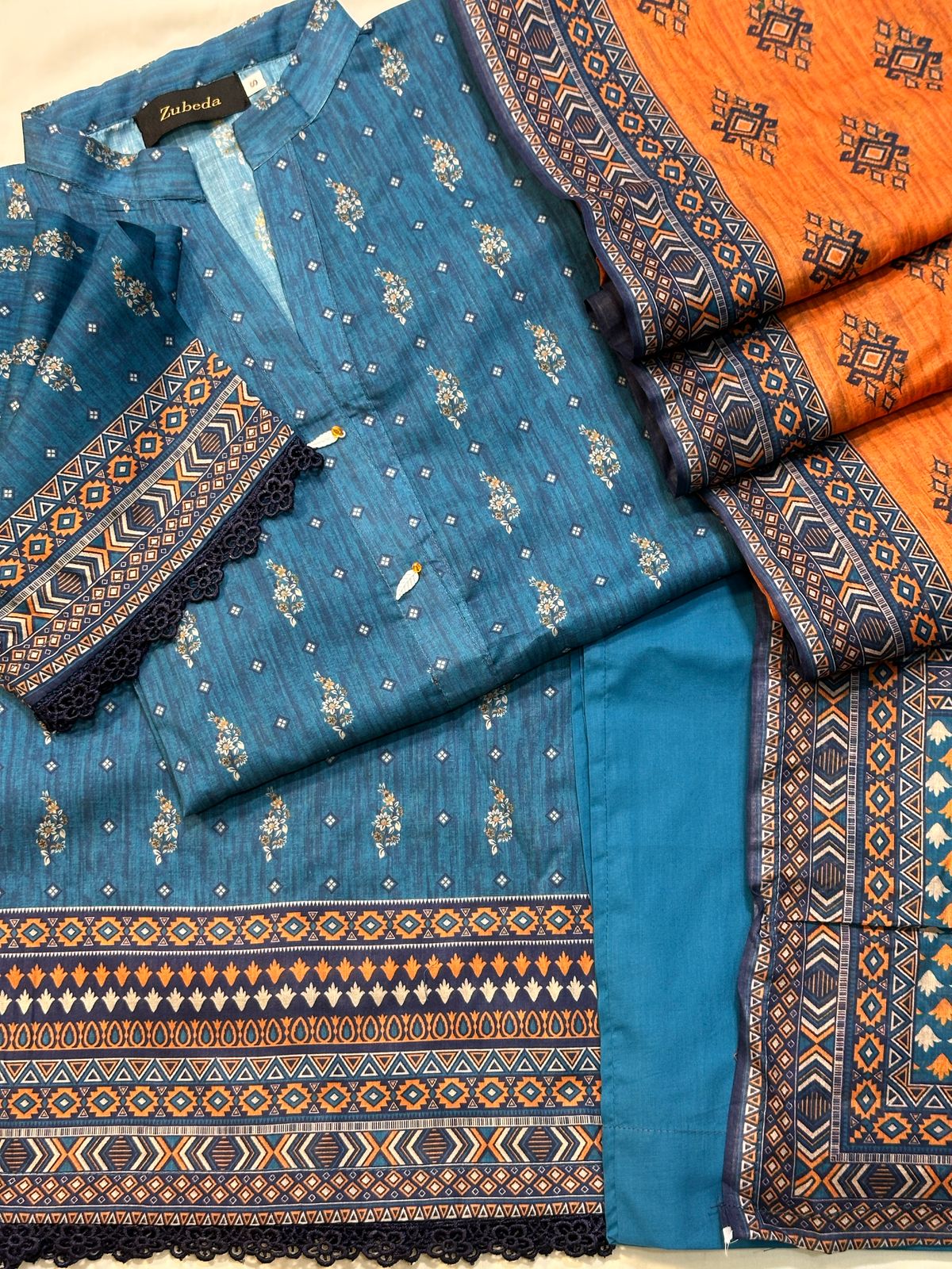 PREMIUM PRINTED LAWN WITH PLAIN DYED PANTS 3 PIECE STITCHED